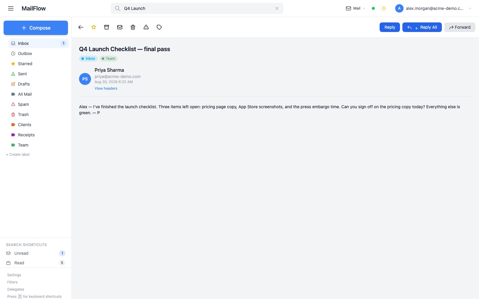 Message view with labels, spam transparency, and one-click reply